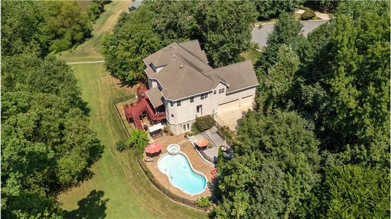 Aerial view of 2.35 acres of wooded privacy.