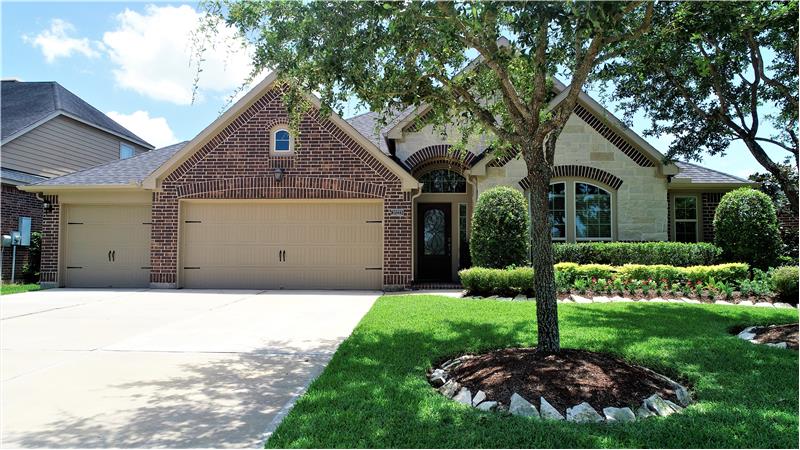 This beautiful Perry built home comes with mature landscaping and beautiful trees.