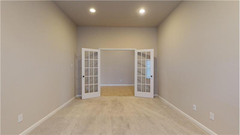 The home features a large flex room that can be used as a game room, media room, or study.