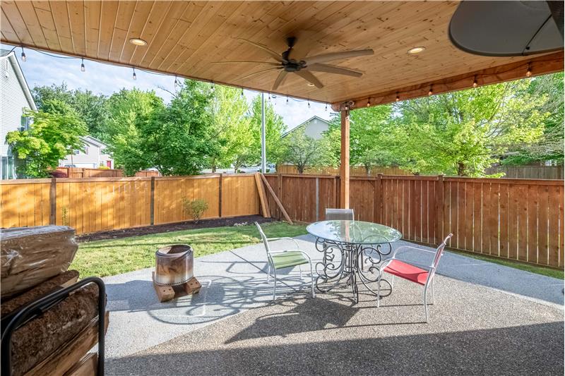 Right off the kitchen nook is the private backyard.