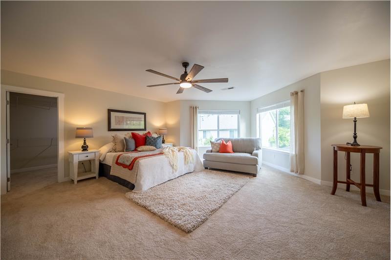 Primary bedroom. Open and spacious. Perfect for that special reading sittee you've always wanted.