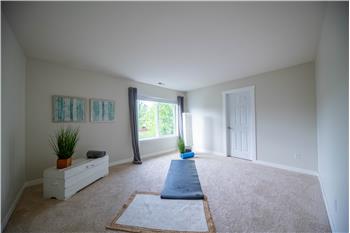 Fourth bedroom with large walk-in closet.