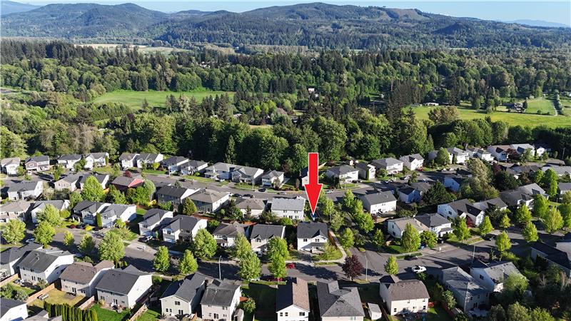 Aerial view of the house in the middle of the community (looking east).