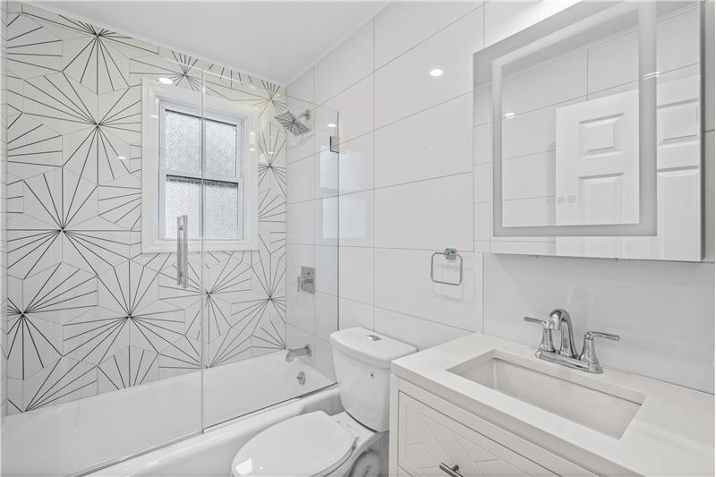 Newly updated full bath on lower level