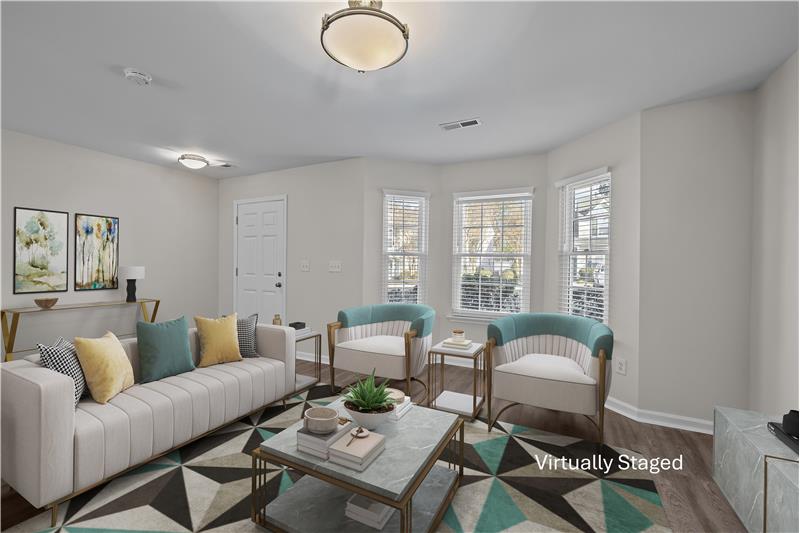 Spacious living room ideal for daily living and entertaining.