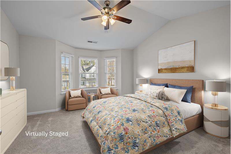 One of two self-contained bedroom suites on the upper floor. Room for sitting area, king-size bed. Brand new carpet.