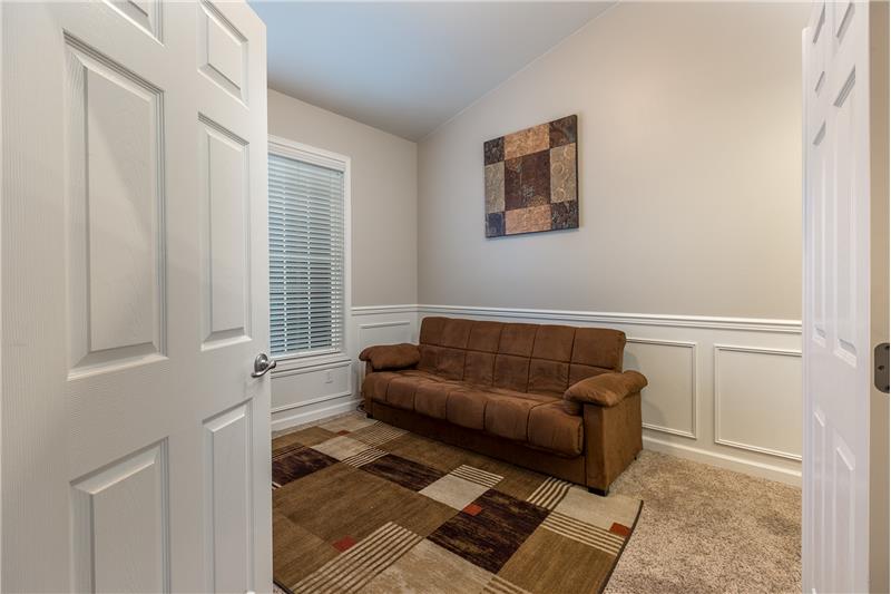 Den/Office with Chair Rail and Wainscoting. 