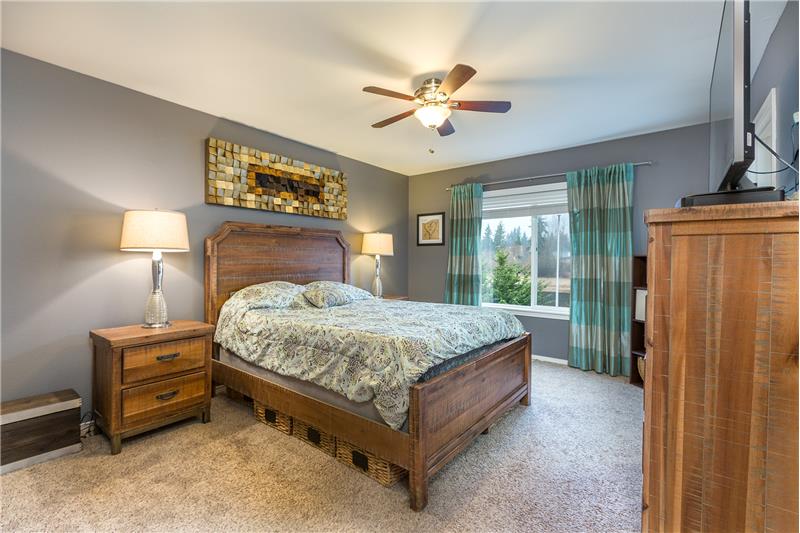 Upstairs Master Bedroom with Walk-In Closet, Beautiful 5 Piece Bathroom and Ceiling Fan.