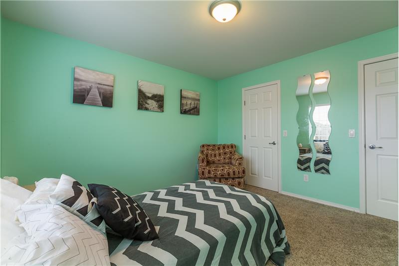 Large Upstairs Bedroom with Views of Mount Rainier and Walk-In Closet.