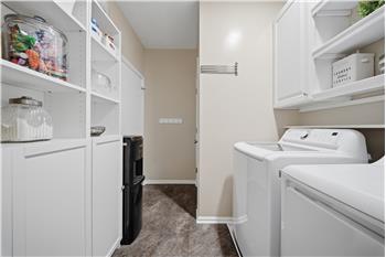 Large laundry room with clost