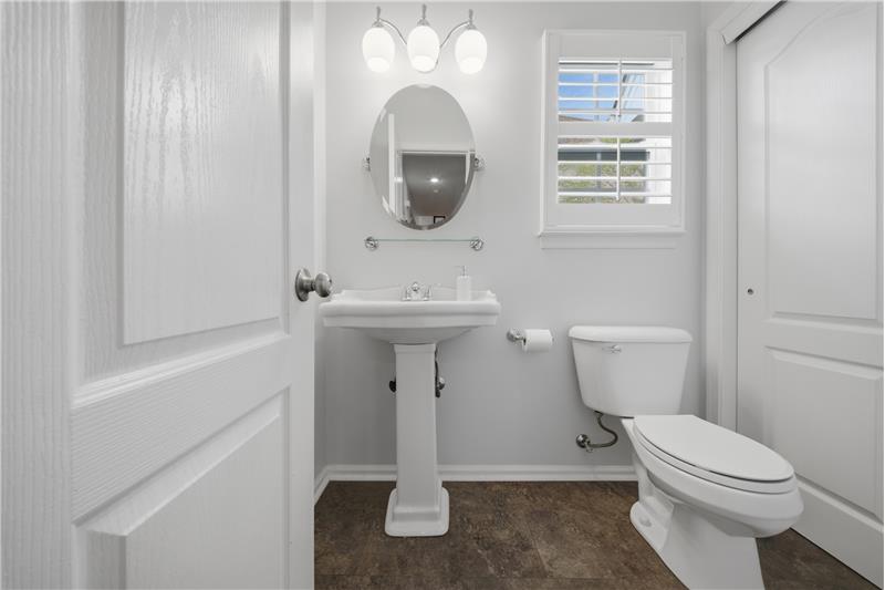 Downstairs half bath with large closet