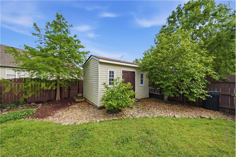 Storage shed with workbench