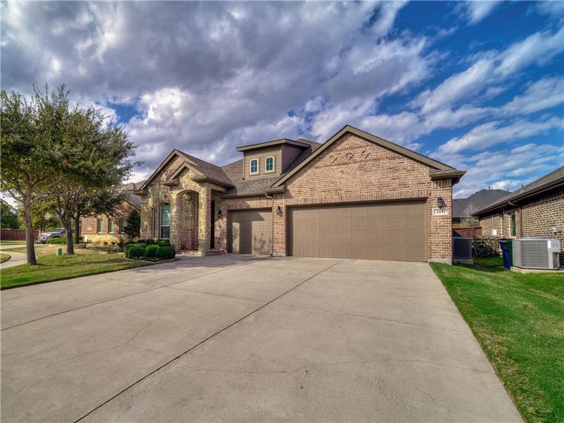 Huge drive way leading to 3 car garage