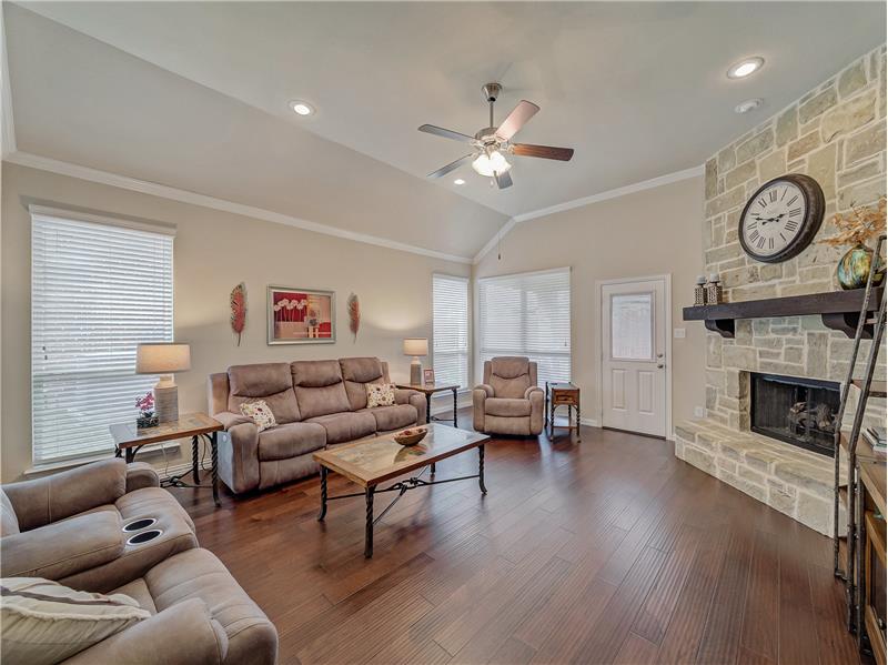 Spacious living room featuring hard wood flooring