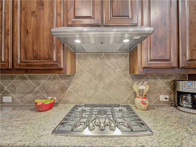 Gas cook top with vent