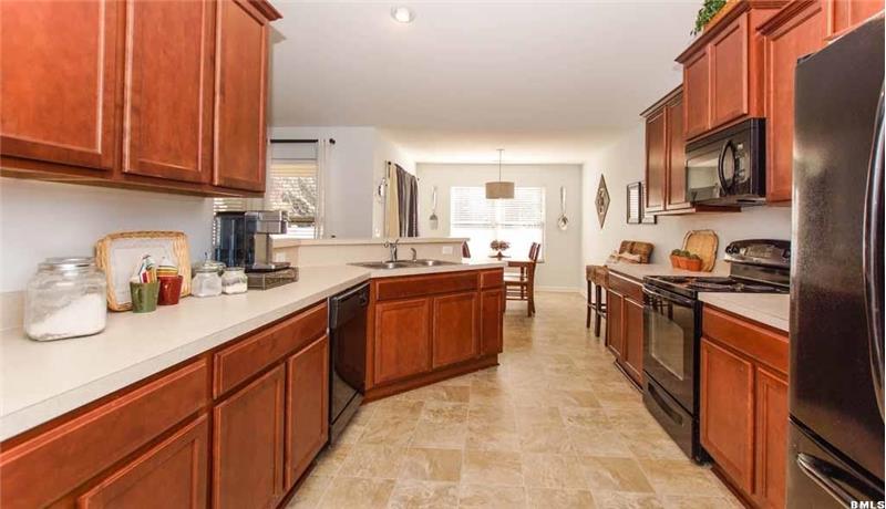 Kitchen with vaulted ceilings
