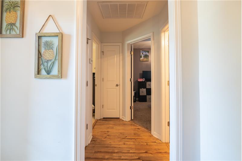 Hallway to 2nd and 3rd bedrooms