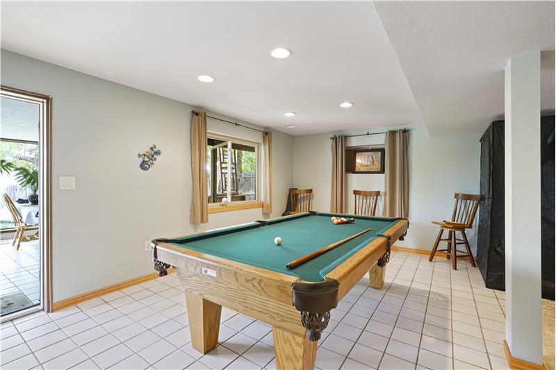 Included pool table in walk-out basement