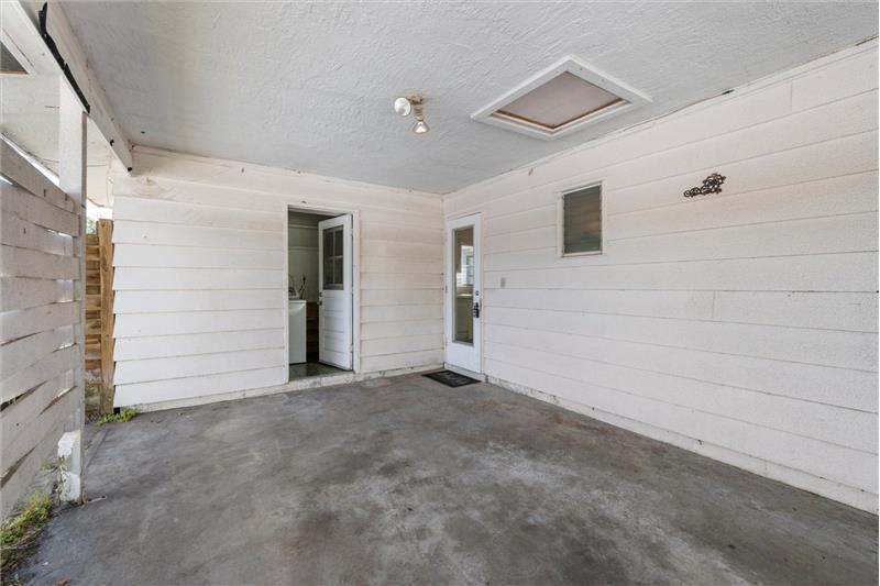 Carport- Left door goes to Laundry Room & Right door leads to the Kitchen