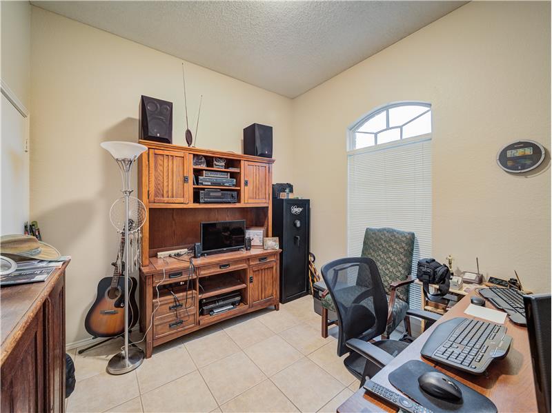 Bedroom featuring light tile floors