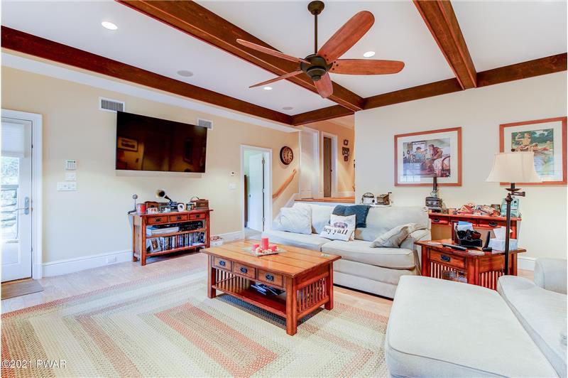 Den with Elevator Entrance