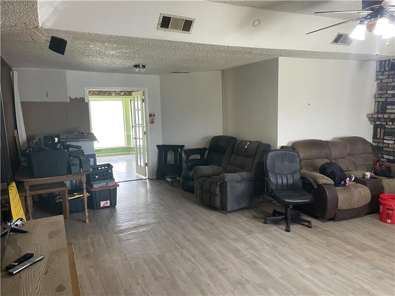 living room doorway to kitchen