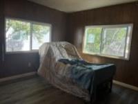 Natural Lighting in Bedroom with Views of Lemon Tree and Dual Pane Windows!