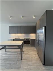  218 NW 25th St 408