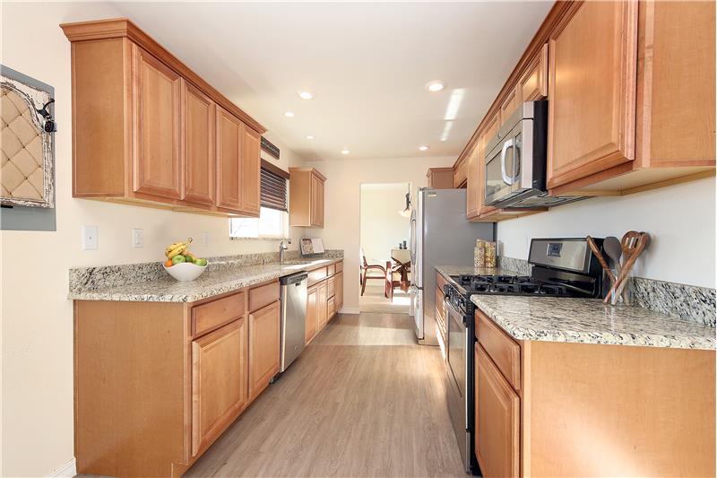 Kitchen with stainless steel appliances and granite counter tops