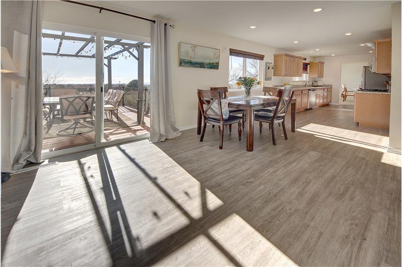 Second dining area provides a walk-out to the back deck