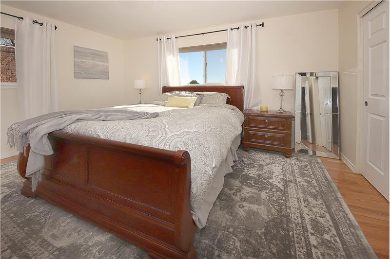 Enjoy mountain and city views from the master bedroom