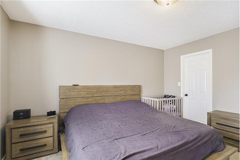 Primary bedroom with large walk in closet