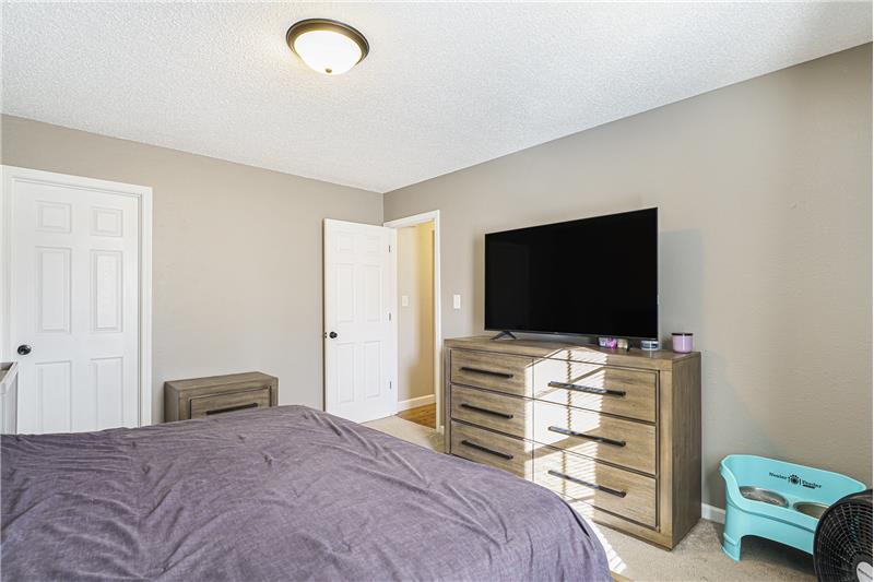 Primary bedroom with newer window