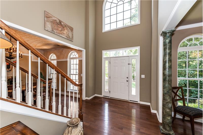 Grand, 2-story foyer provides a welcoming introduction to the home.