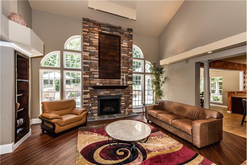 Windows flanking the fireplace provide great natural light.