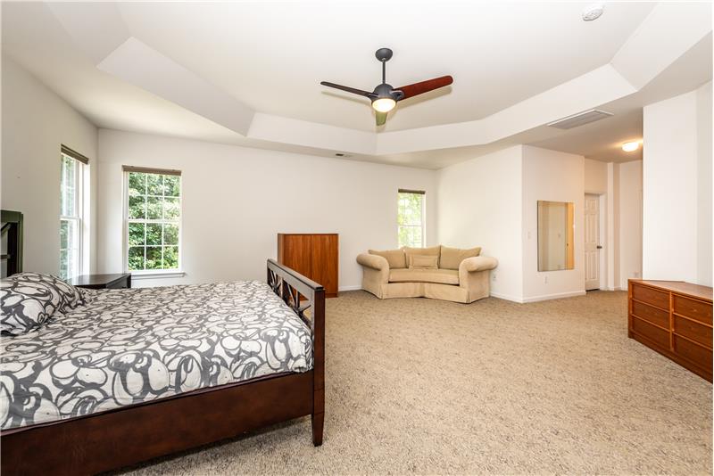 Owner's suite has plenty of space for a king-size bed, larger dressers, sitting area. Two walk-in closets.