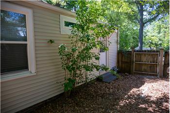 Side entrance with paver patio