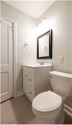 Updated vanity, lighting and mirror