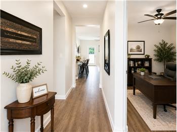 Entry way with office space, additional living space, or formal dining. Staged for online photos.