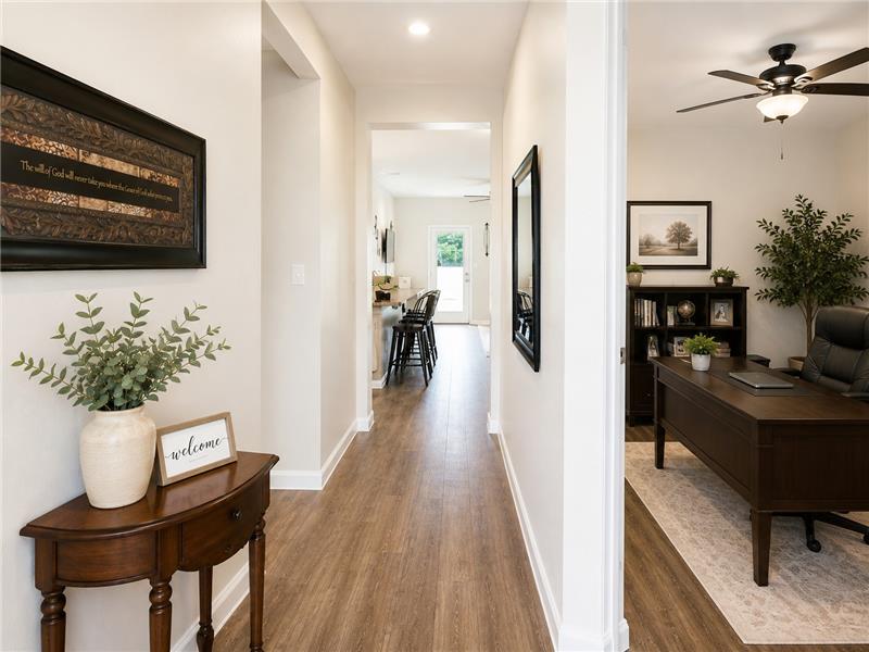 Entry way with office space, additional living space, or formal dining. Staged for online photos.