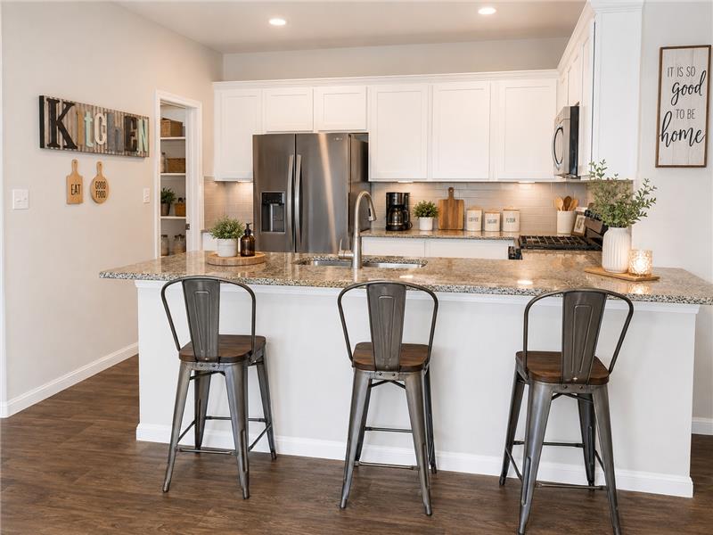 Kitchen with Pantry
All appliances convey with property. 
Staged for online photos