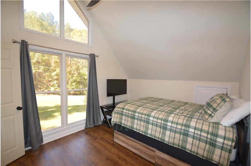 bedroom 3 with vaulted ceiling