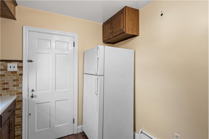 Door to 1 Car Heated Garage