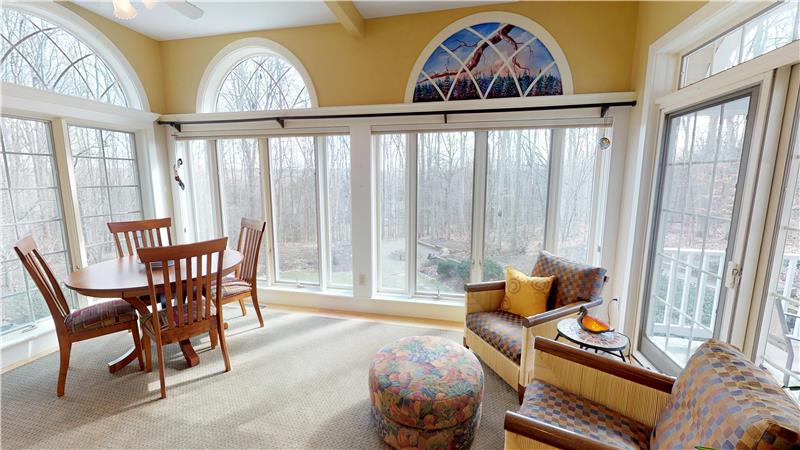Can you imagine all four seasons in this fabulous sun room??