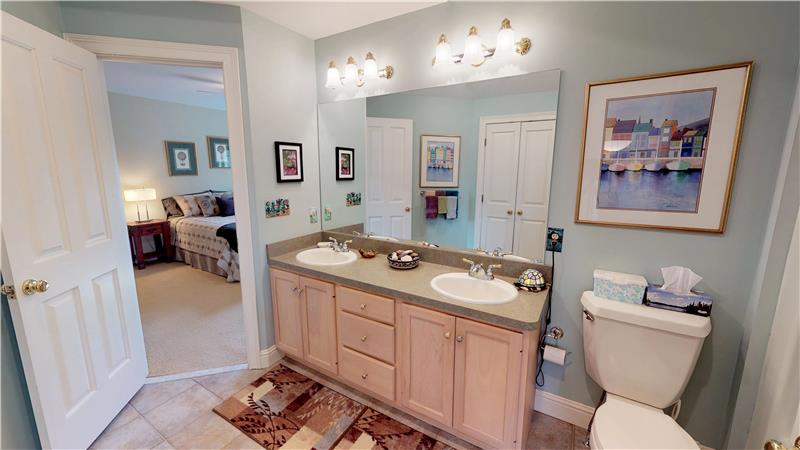 Full bath on second with neutral decor adjoins two bedrooms!