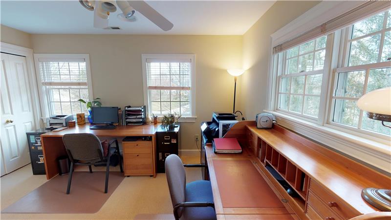 Bedroom 1 with neutral decor and lots of natural light!