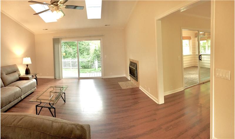 Open Floor Plan with Vaulted Ceilings and Skylights