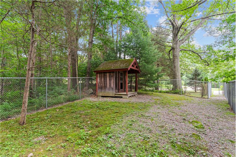 A special home for the family dog with fenced in area