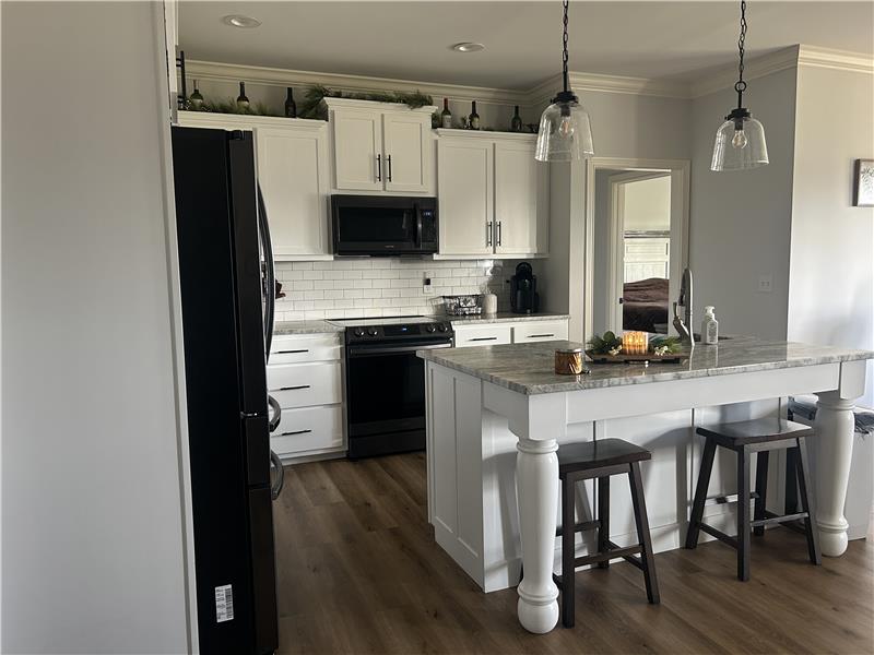 Granite countertops with pretty white cabinets