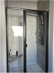 Tiled shower in the master bath